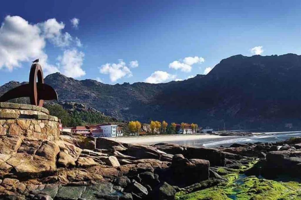 Solpor De Ezaro Villa Dumbria Bagian luar foto